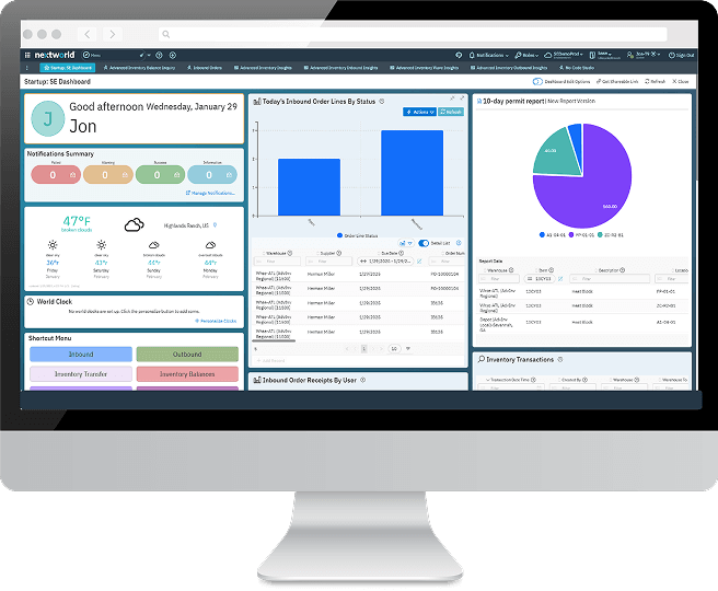 Computer with Nextworld platform dashboard on the screen